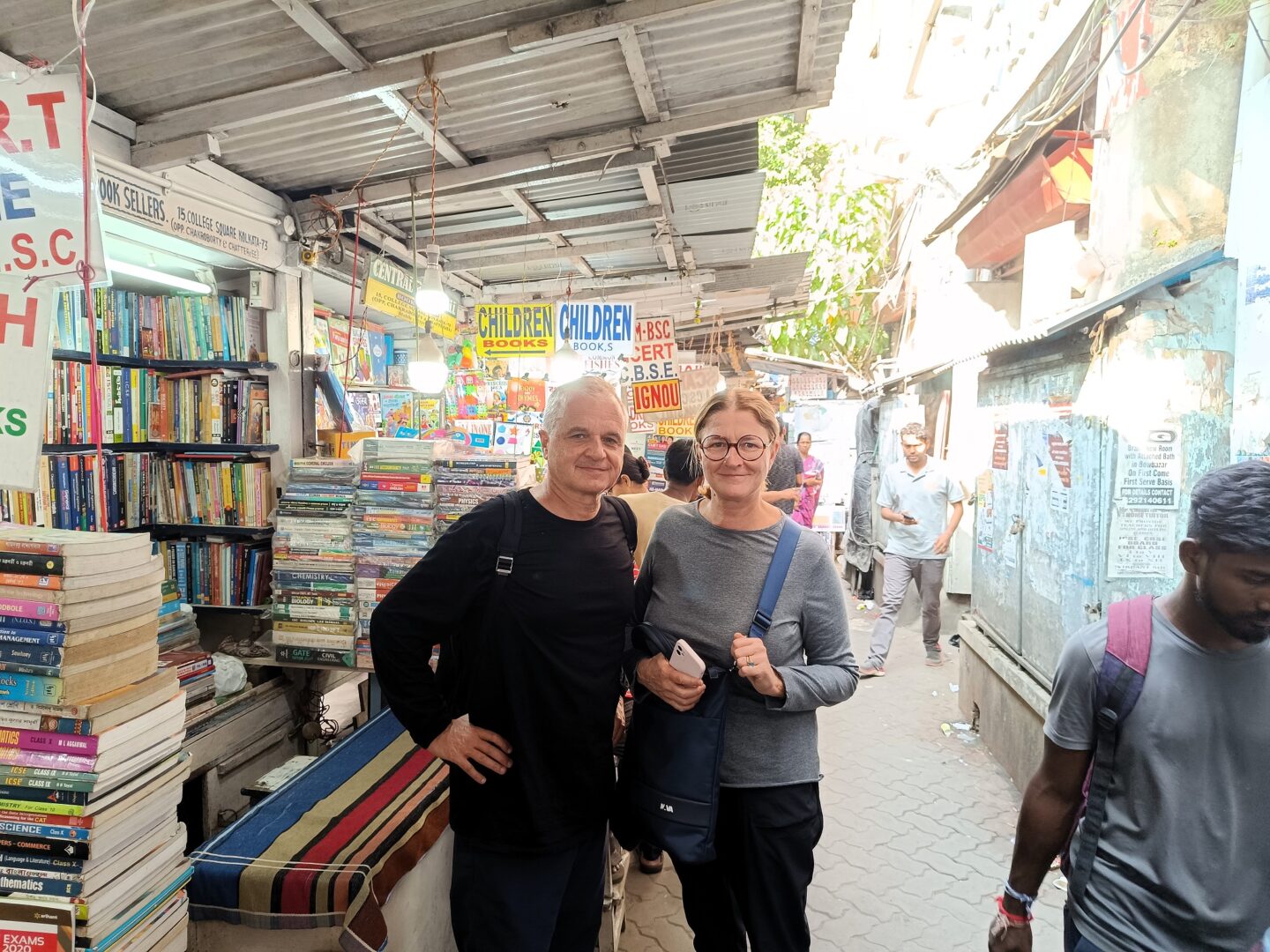Busy street filled with book stalls.